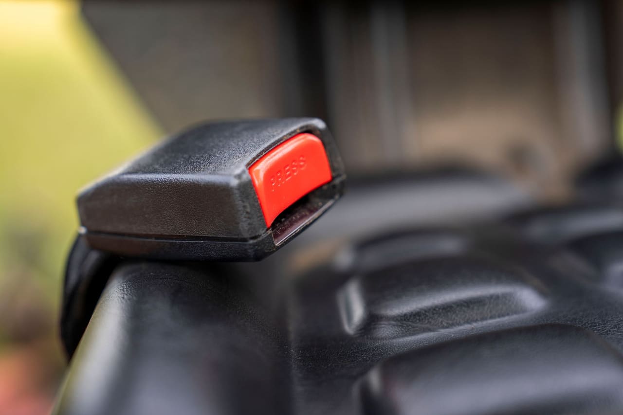A seat belt buckle on a car seat