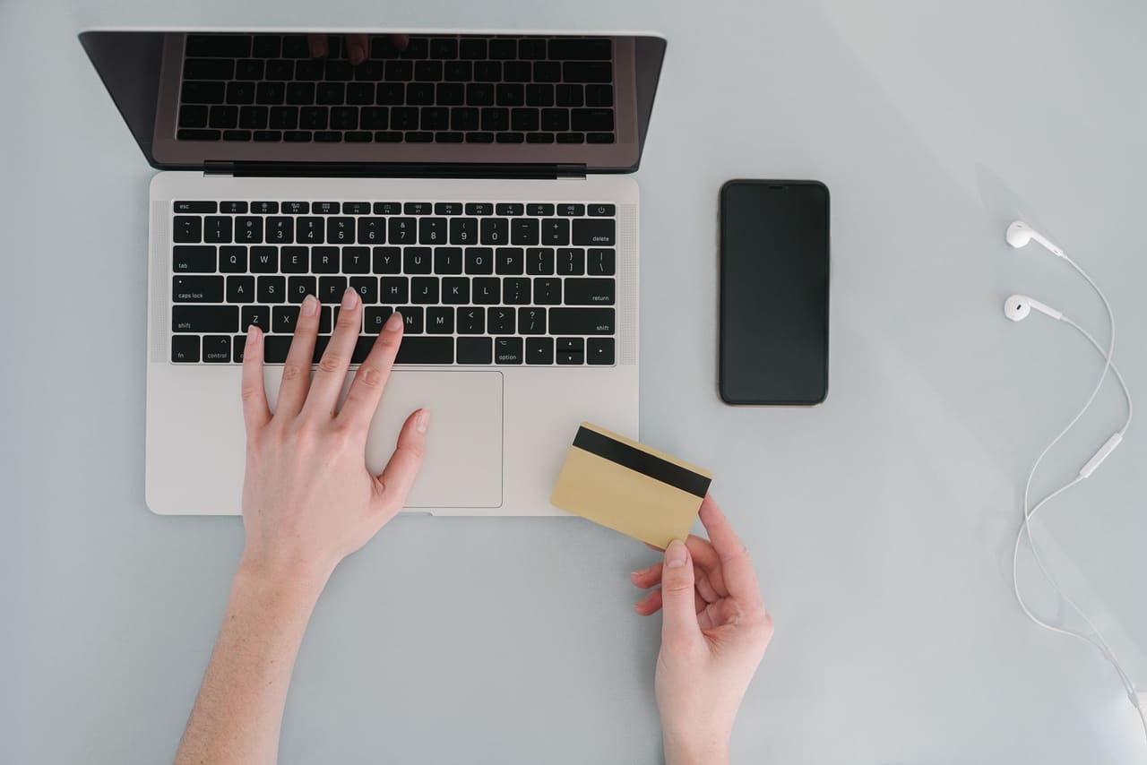 An online transaction with a bank card at a laptop
