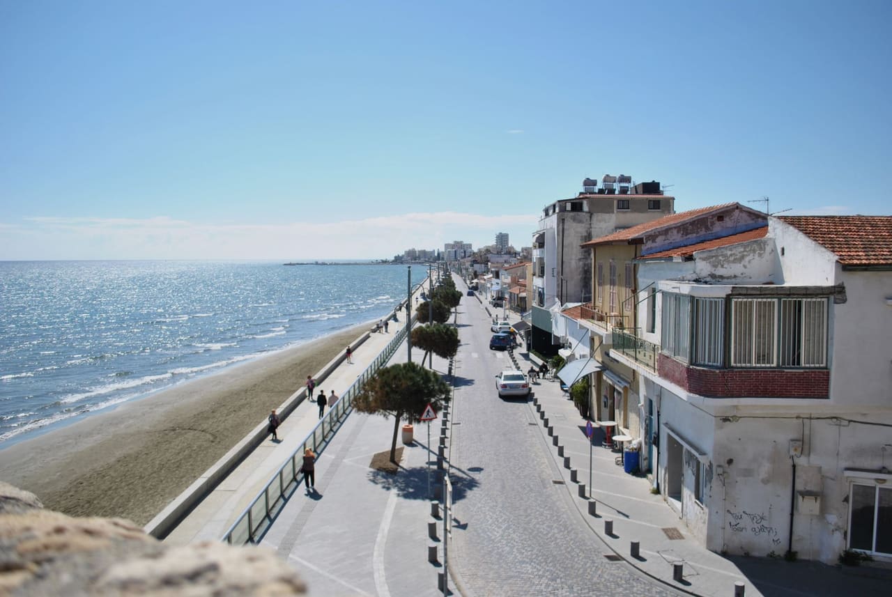 The Larnaca seafront and its palm-lined promenade